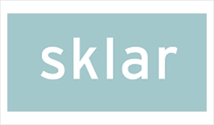 Logo with the text 'sklan' on a light teal background.