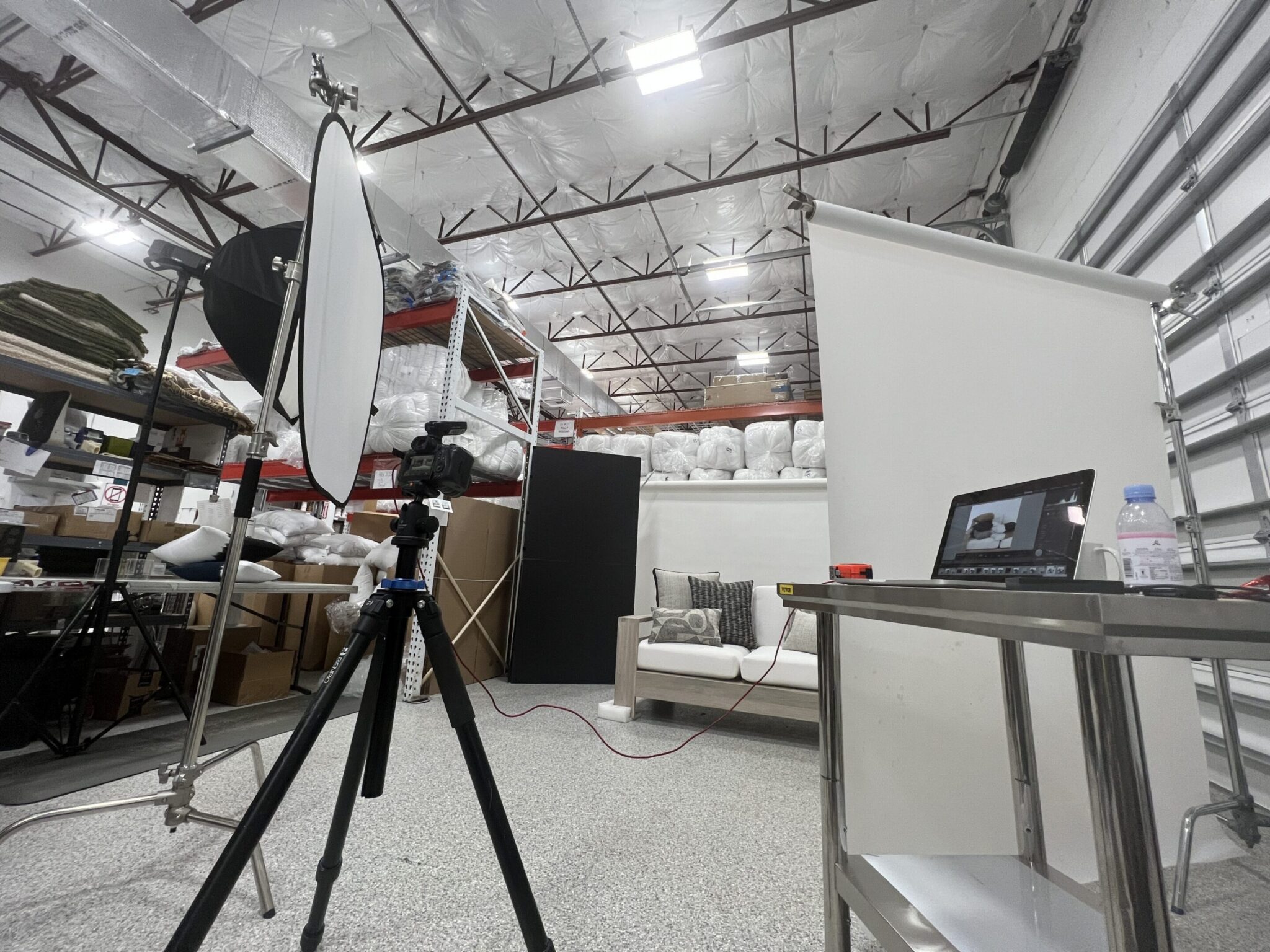 Photography studio setup with lighting and backdrops.